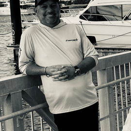Dock portrait of Gino Raymond DellaCava